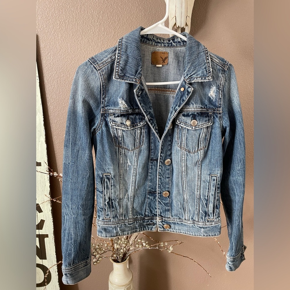 Distressed denim jacket
